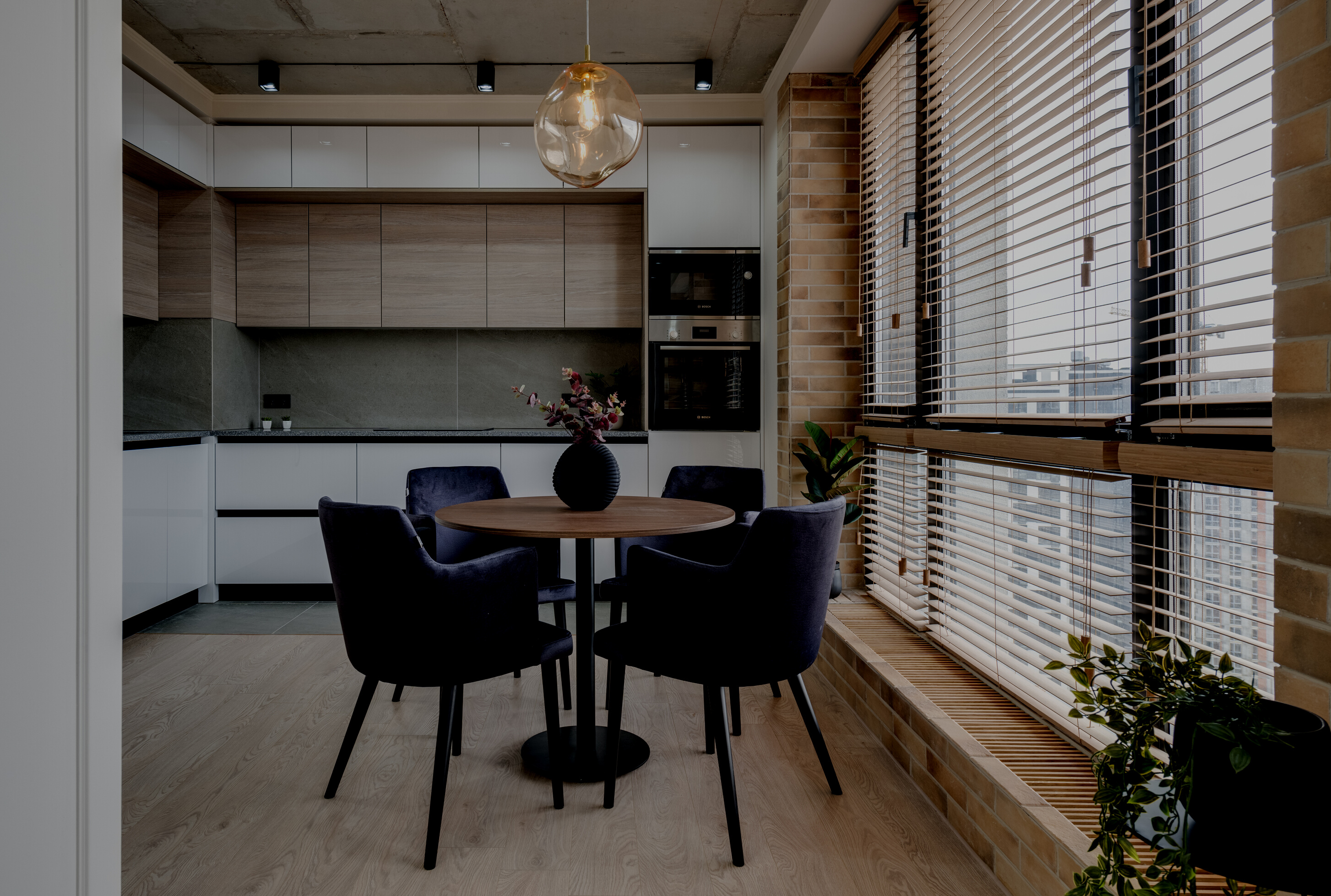 Ceiling Lamp above a Table in a Kitchen